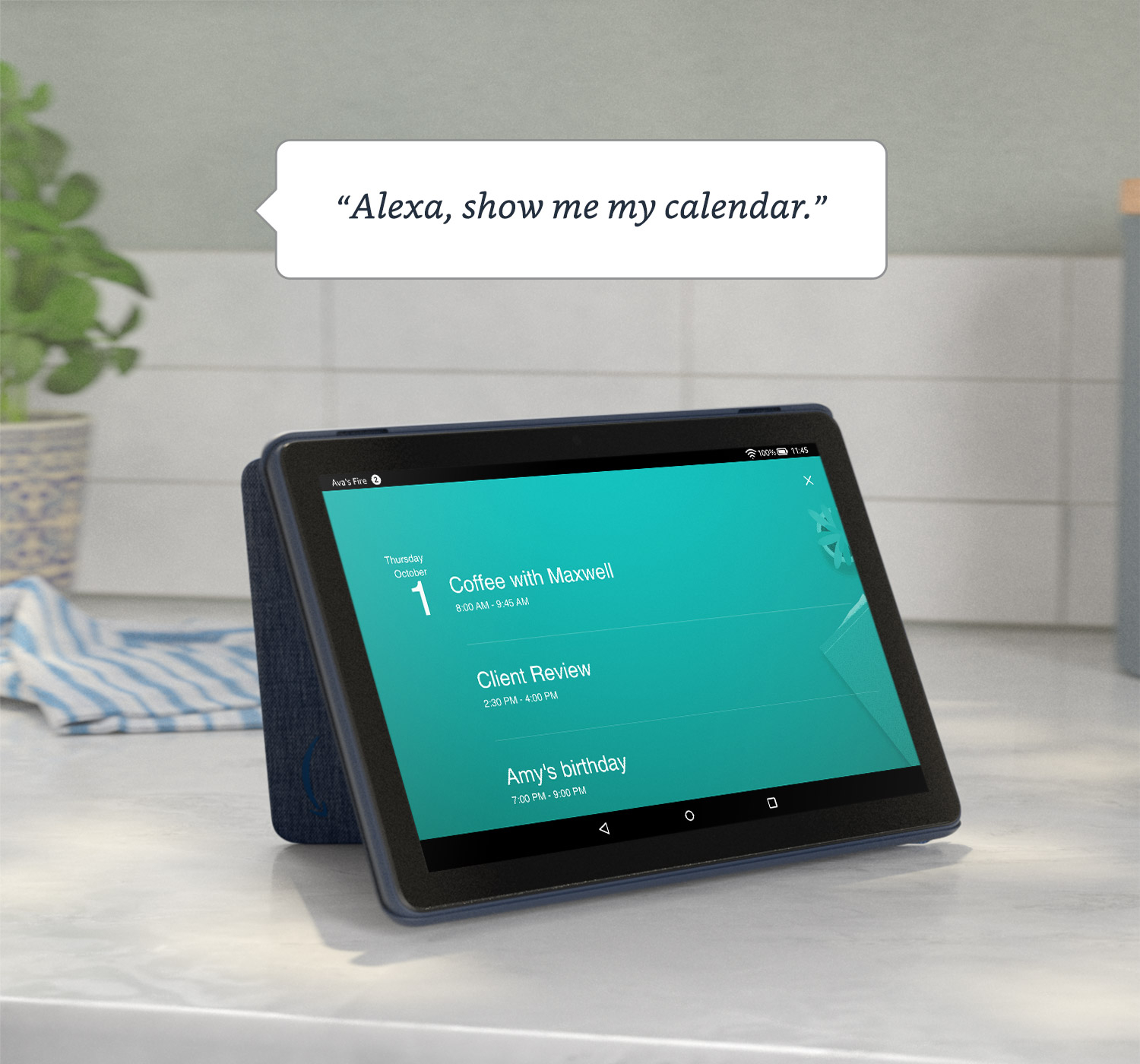 "Alexa, show me my calendar." Fire HD 10 tablet resting on kitchen counter and displaying a daily calendar.